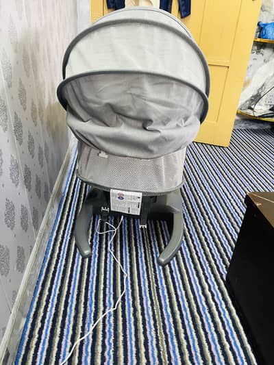 Baby cot electric