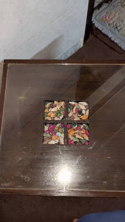 one center table with two side tables