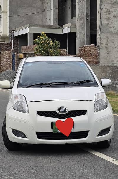 Toyota vitz 7/12 pearl white genuine condition
