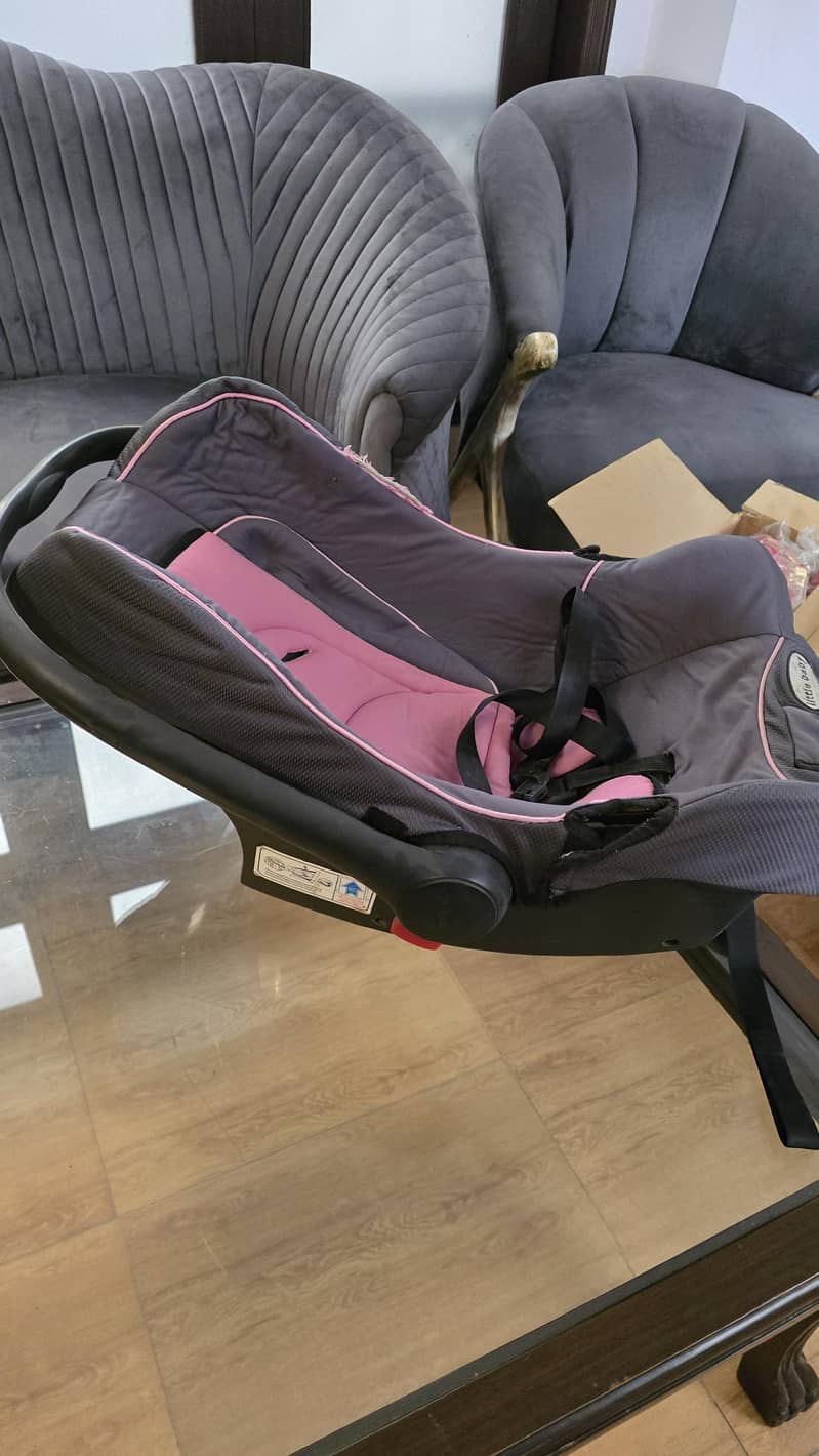 carry cot two available 7