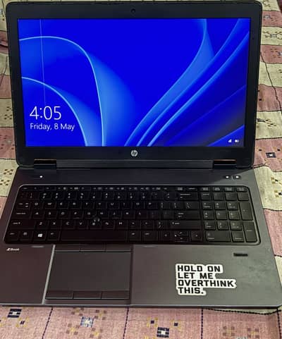 HP ZBook 15 Workstation Laptop with a green thin line