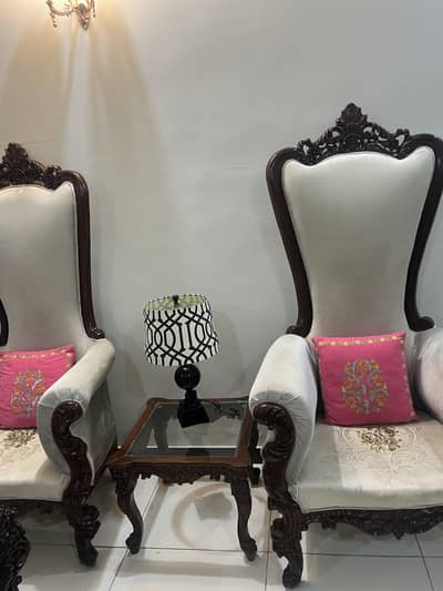 Pair of chairs with table. .