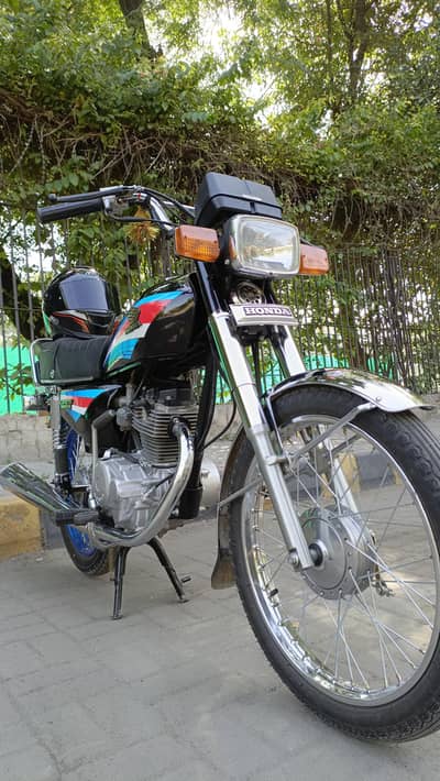 Honda 125 - Total Genuine Bike
