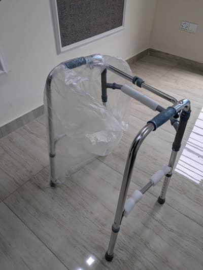 Brand new ADULT WALKER WITHOUT WHEELS FOLDING FOR PATIENT