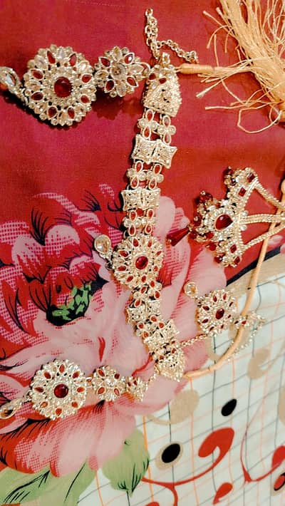 red and golden colour necklace