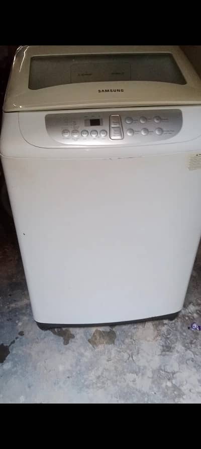 Samsung top load 11 kg washing mashine neat and clean