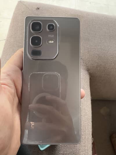 Infinix note 50 with box and original charger in warranty