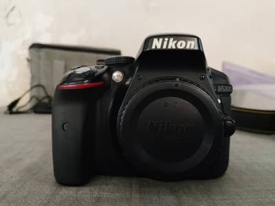 Nikon D5300 with AF-P 18-55 lens, with original box, papers and manual
