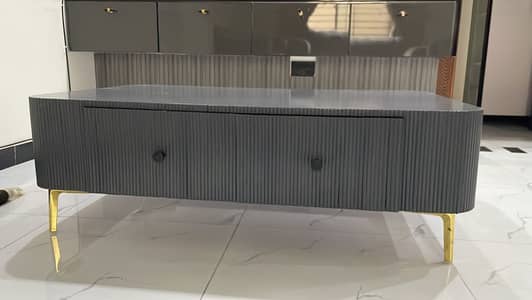 Grey centre table with storage drawers