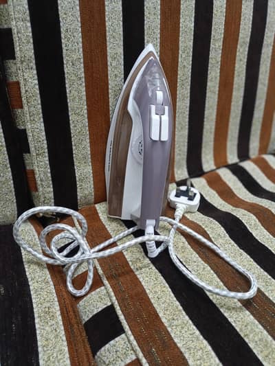 Olsenmark iron for sale