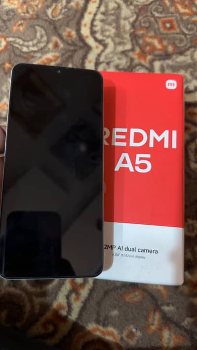 Redmi A5  with orginial box And Original charger 8-9 months wrantty