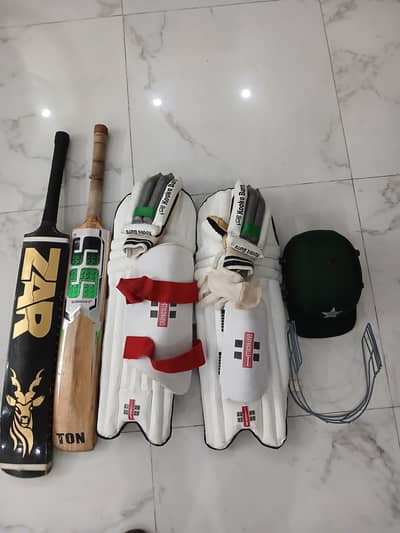 1 HARD BALL CRICKET KIT AND 1 TAPE BALL BAT.
