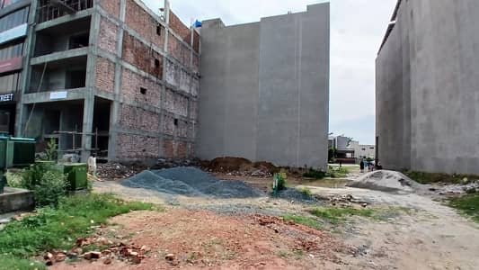 4 Marla commercial CCA 6 plot for sale 60' feet wide Road DHA Lahore phase 7