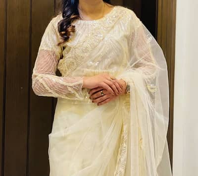 White golden fancy net saree