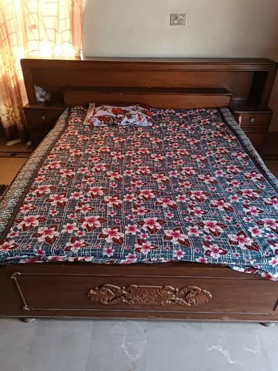 Bed with side drawers
