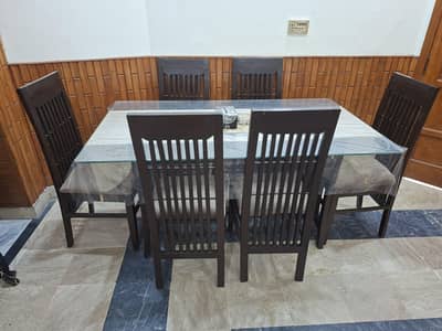 glass dining table and 6 chairs