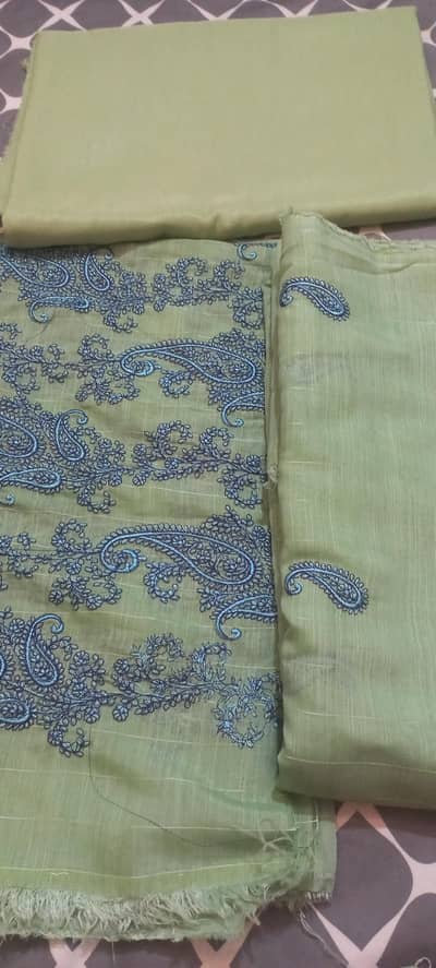 unstitched 3 piece khaadi net  embroidered suit