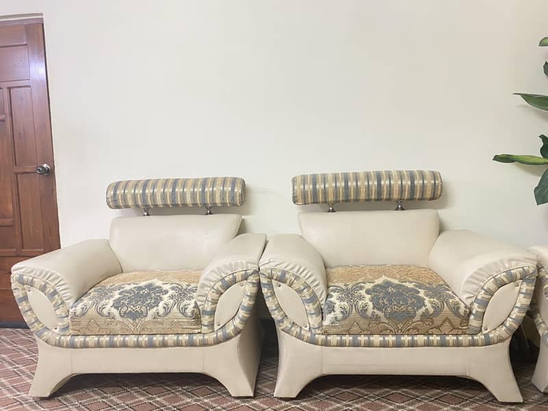 sofa set ( 7 seater) + table 2