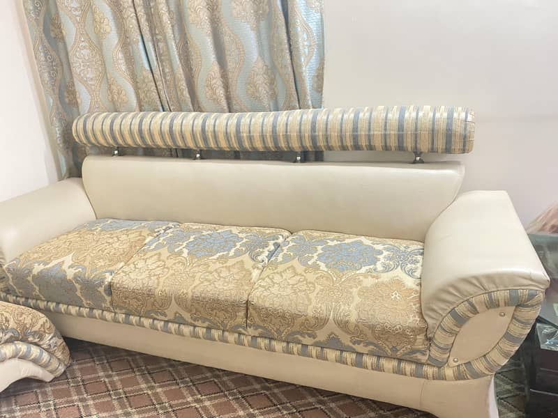 sofa set ( 7 seater) + table 8