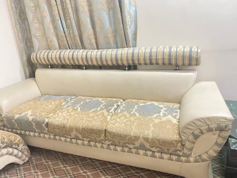 sofa set ( 7 seater) + table 9