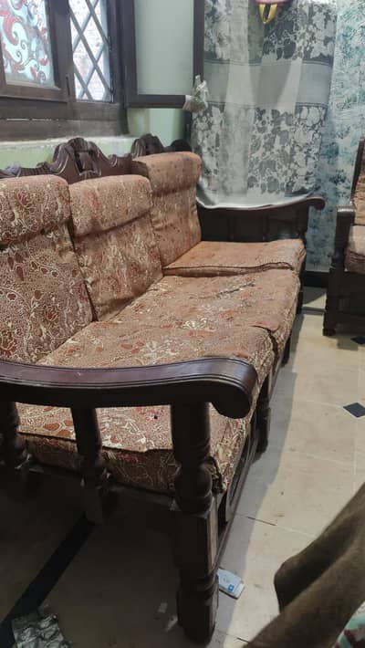 solid wood sofa set and 2 black beauty sofa sitting with table