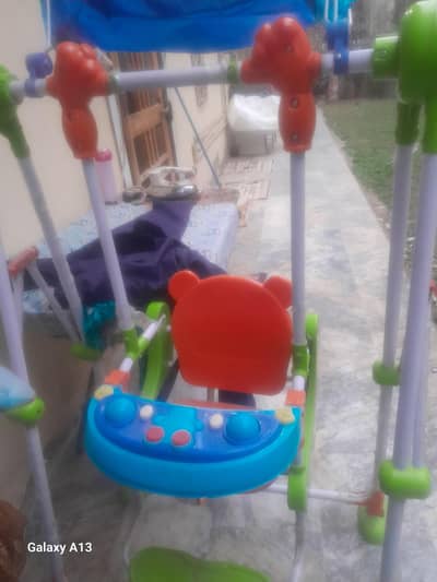 a very fine quality swing in blue colour with lights and music