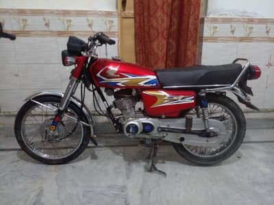 Honda 125  in original condition very good sound with biometric