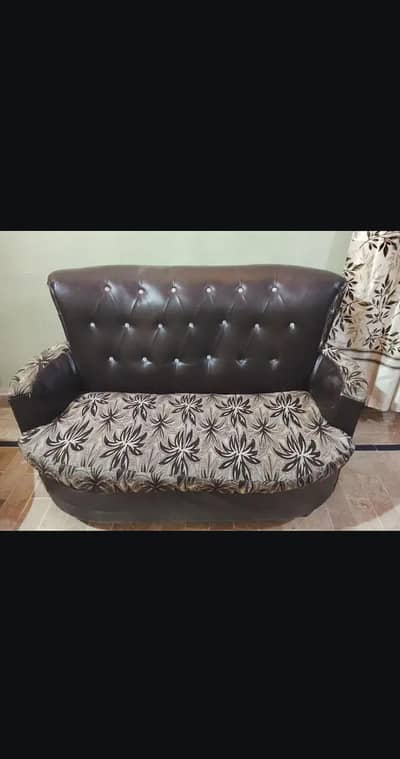 7 Seater good condition sofa set in 25000 PKR and with new cover 30000