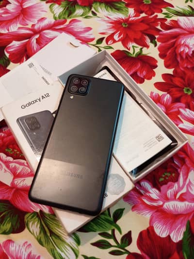Samsung a12 All ok with box 4/128. GB pta approved