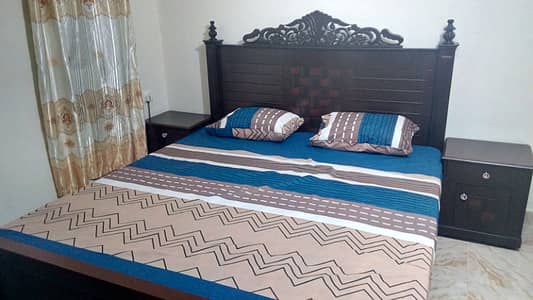 Furnished Independent Flat/ Apartment with fuuly tiled and marble 2 Rooms for Rent in Q Block Model Town Lahore with AC, Fridge, LED TV, Curtain, Stove, Beds, wood work, UPS, Kitchen & bath room Rent = 36000