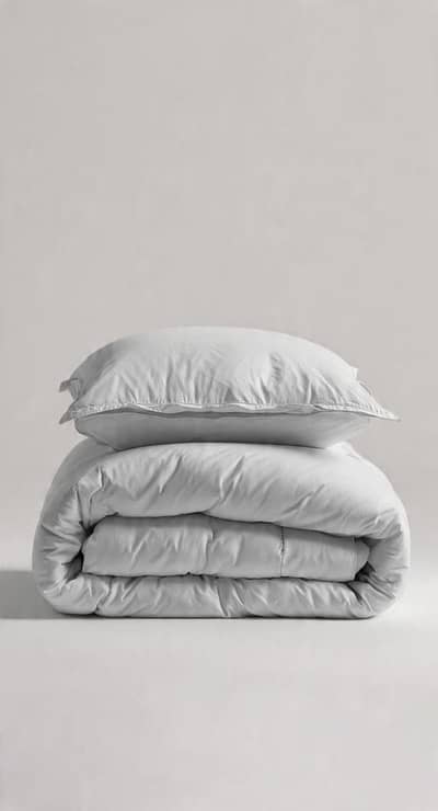 comforter in gray colour