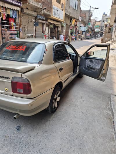 Suzuki Baleno model 2004 call 0323 5410462