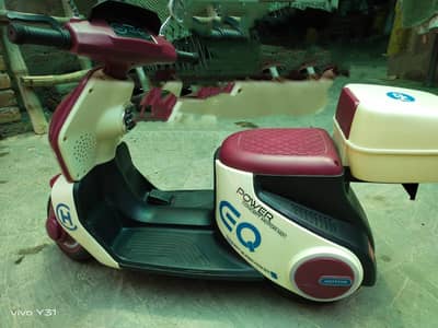 Vespa scooty for children