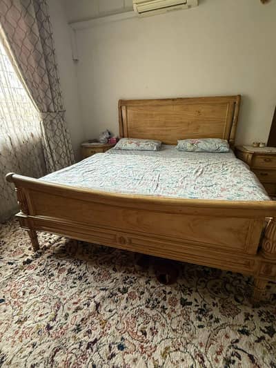 King size bed with side tables and dressing table