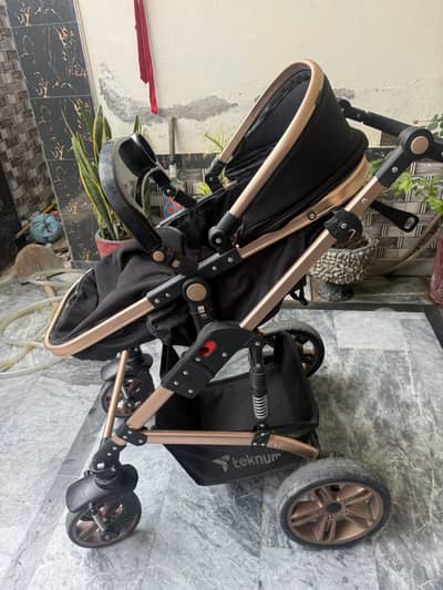 2 IN 1 Imported Teknum Luxury Baby Stroller – Excellent Condition