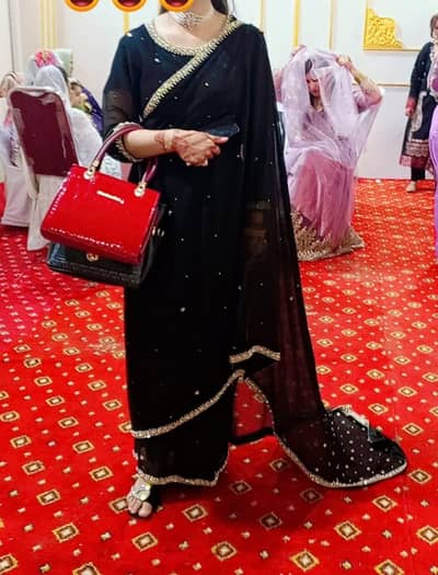 black embroidery saree