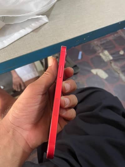 Iphone 12 used contant num inly whatapp red clour