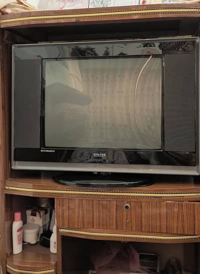 singer tv with trolly