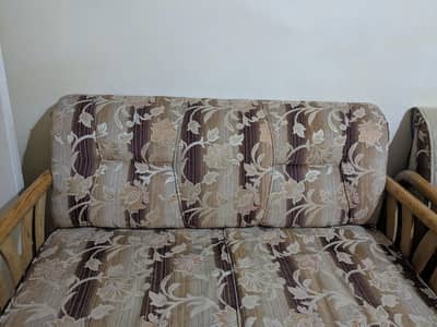 solid wood seven seater sofa in new condition