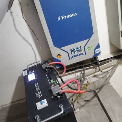 Fronus PV 7000 Hybrid Solar Inverter or 100AH battery