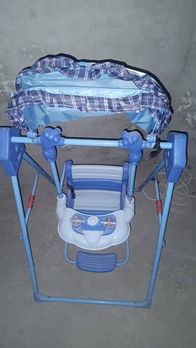 baby swing jhulla matel and plastic full ok and good almost New