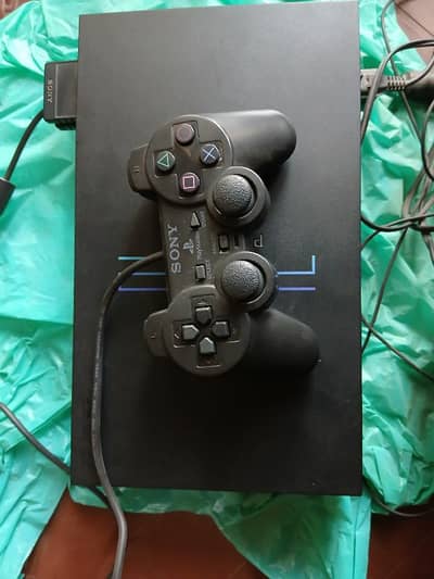 Sony PS2 With 25 games installed in USB ALL OK Cash on Delivery
