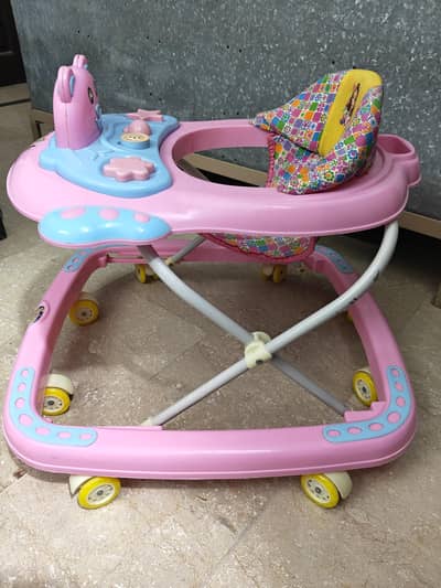 Baby Walker- Foldable - Adjustable Height - Excellent Condition