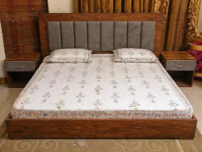 wooden low profile bed with two side tables