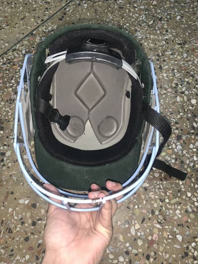 Hard ball cricket helmet