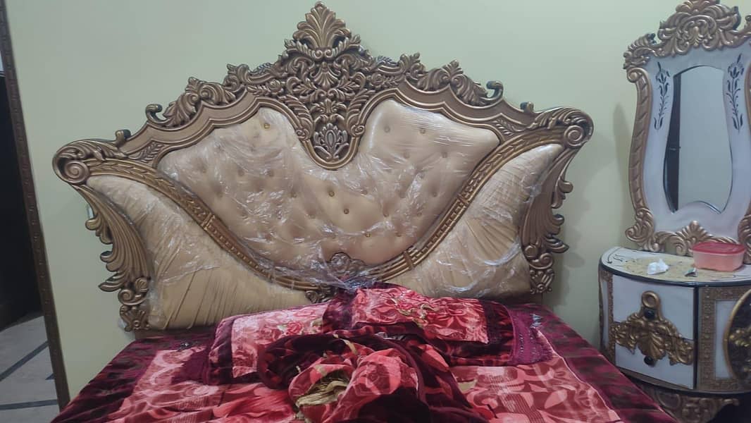 bed with side table 0