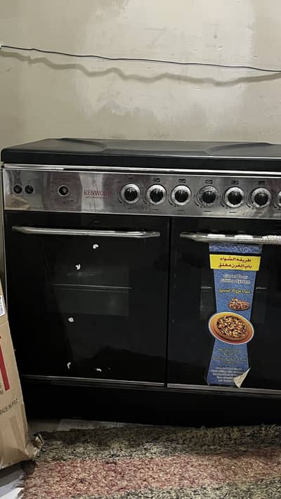 New non used kenwood dual pizza roast oven