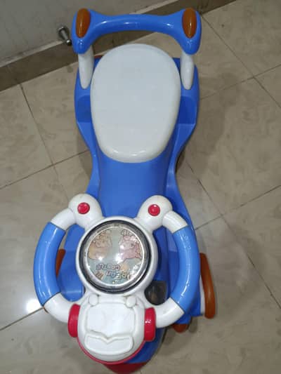 Kids car  ,move with handle, blue color, kids vehicle, fast, fun