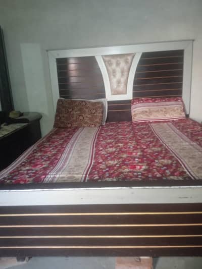 bad and mattress and side table for sale