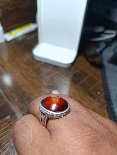 Genuine silver ring with amber stone